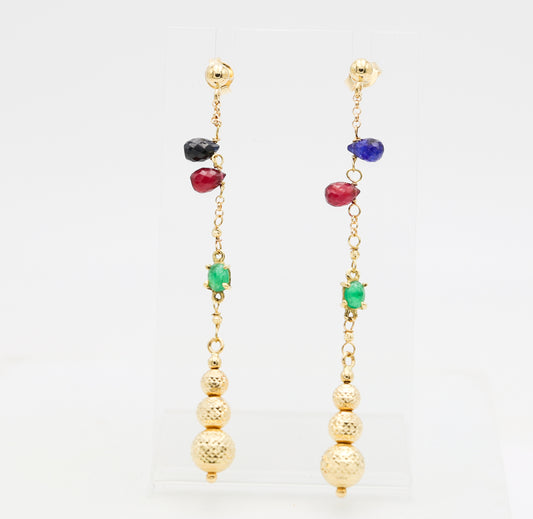 Orecchini in oro pendenti con pietre