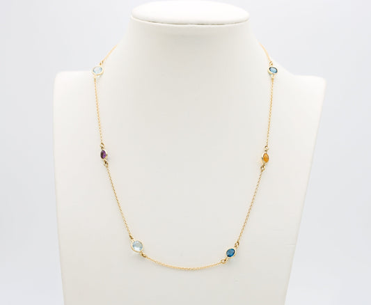 Collana in oro con Acquamarina Topazi e Pietre