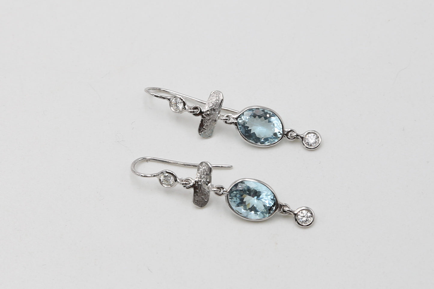 Gold aquamarine and diamond earrings