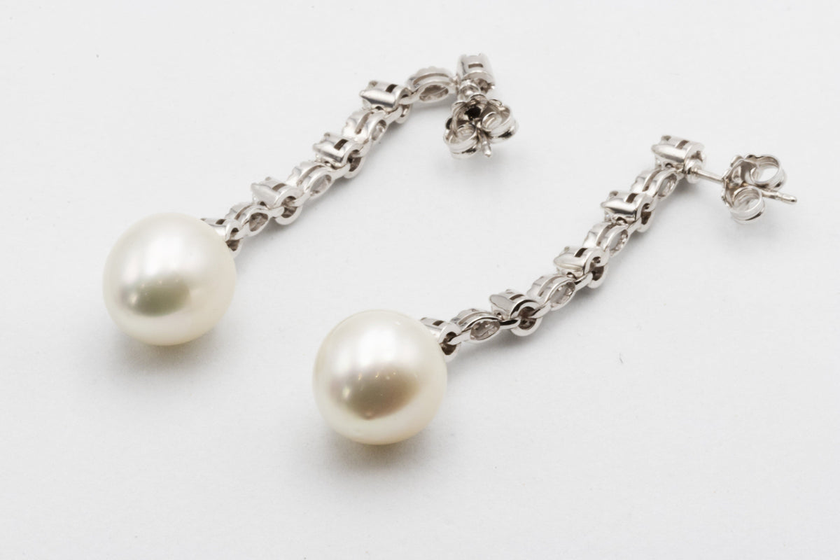 Boucles d'oreilles pendantes avec diamants et perles