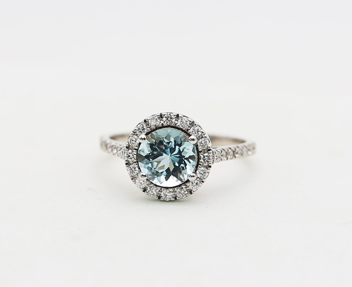 Gold ring with aquamarine and diamonds