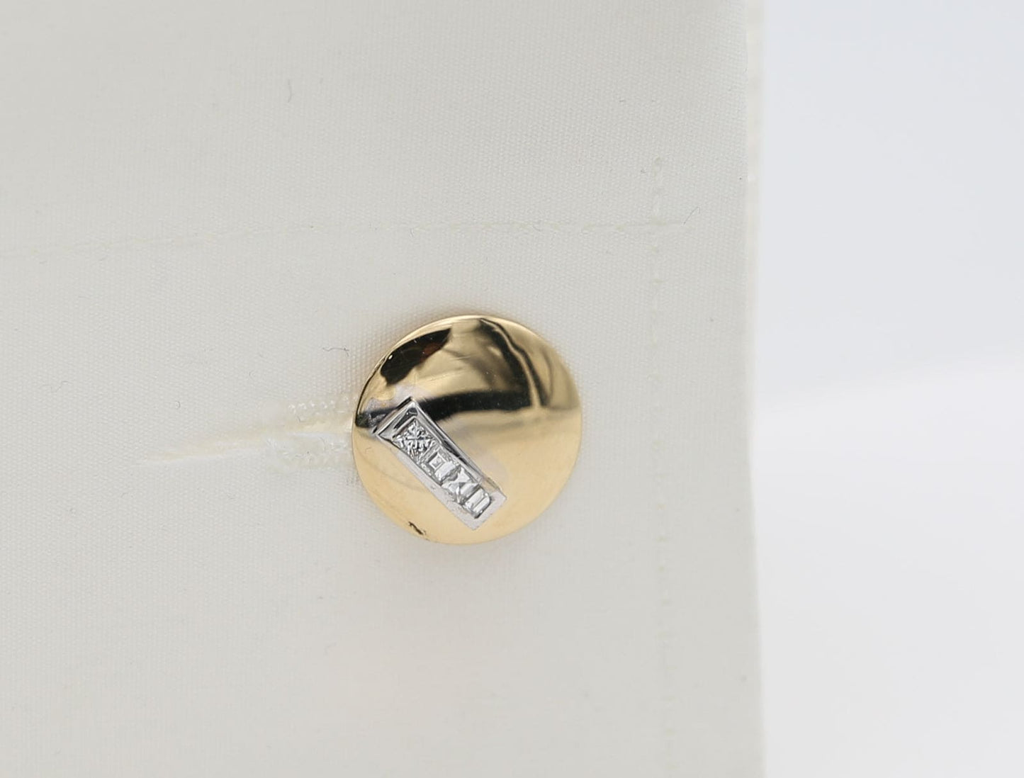 Gold cufflinks with diamonds