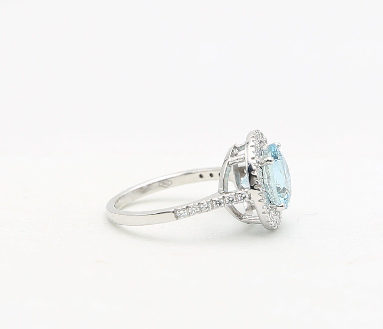 Gold ring with aquamarine and diamonds