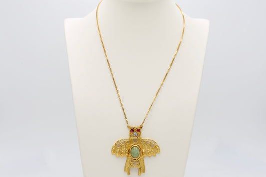 Collana con amuleto e pietre