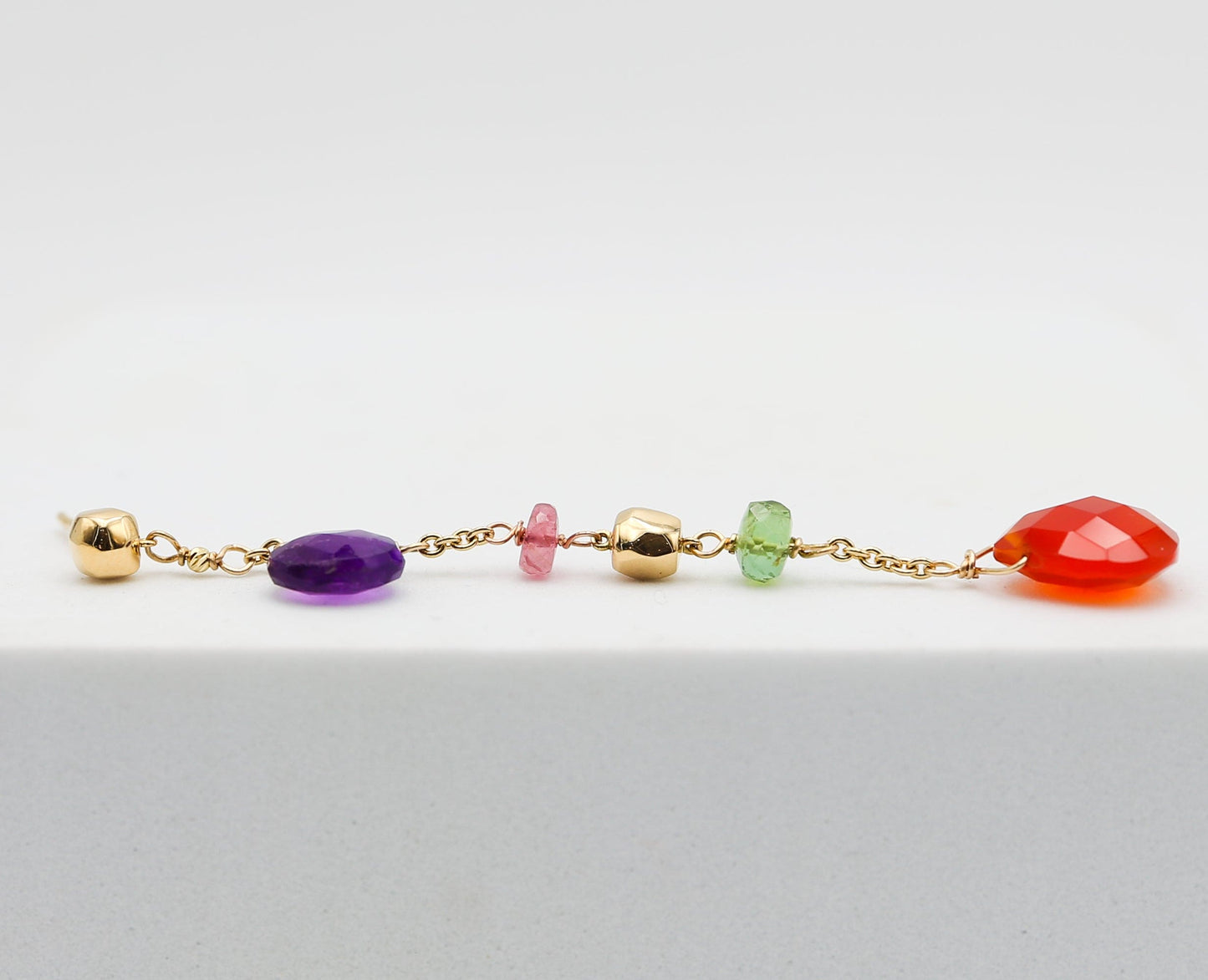 Gold earrings with stones