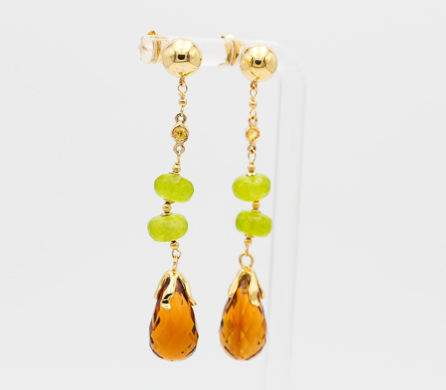 Gold earrings with stones