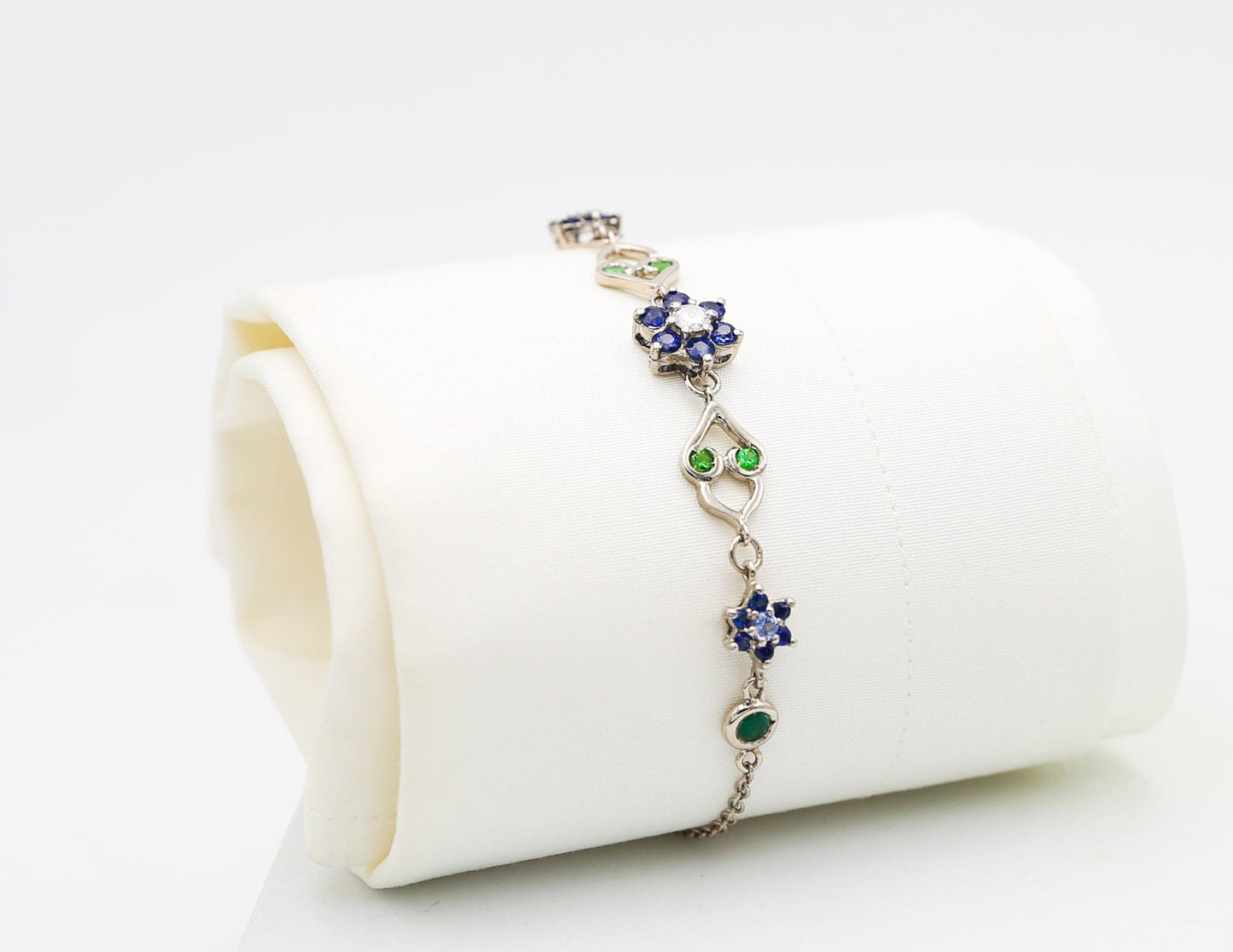 Gold bracelet with stones