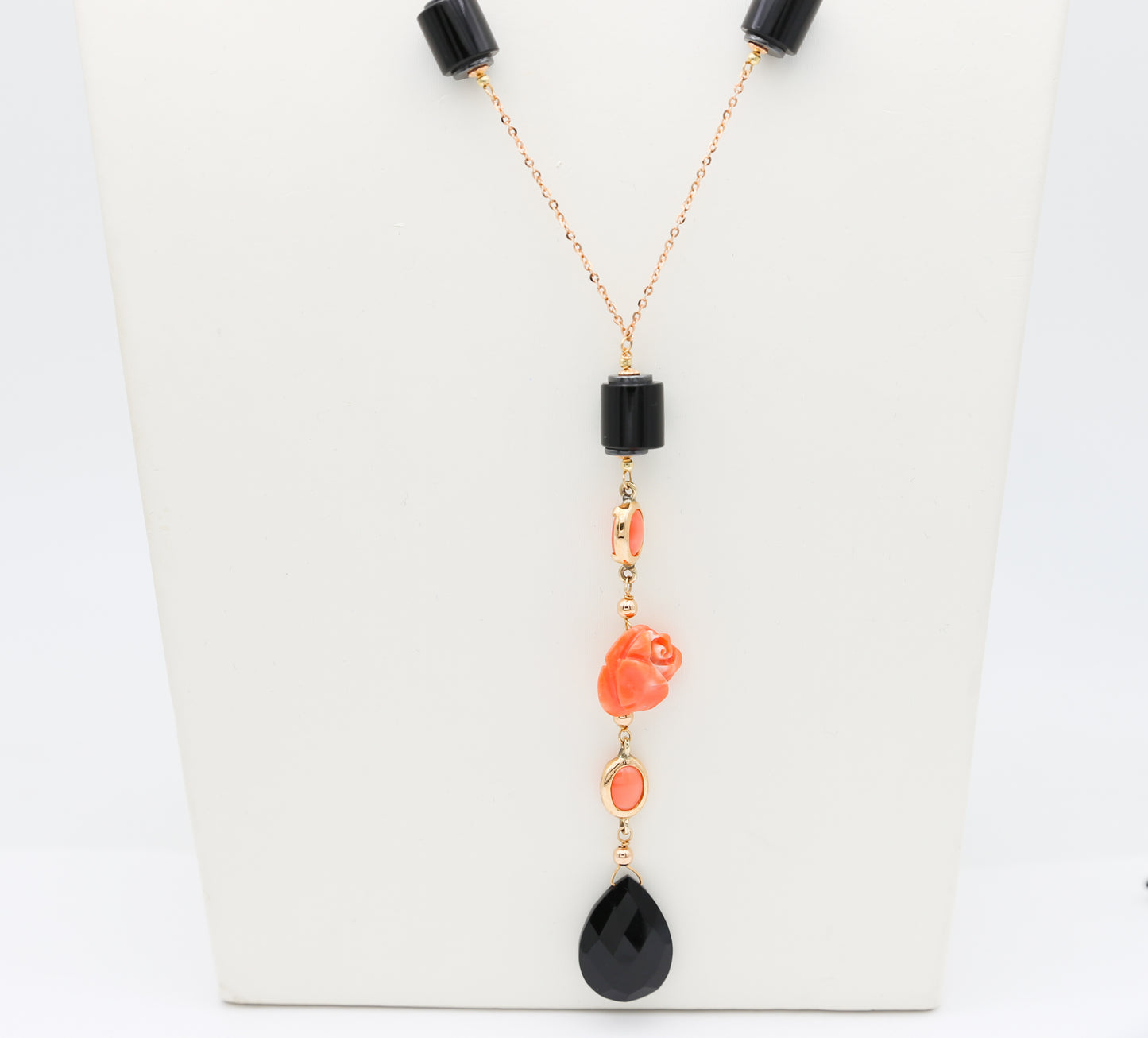 Collana in oro con corallo e onice