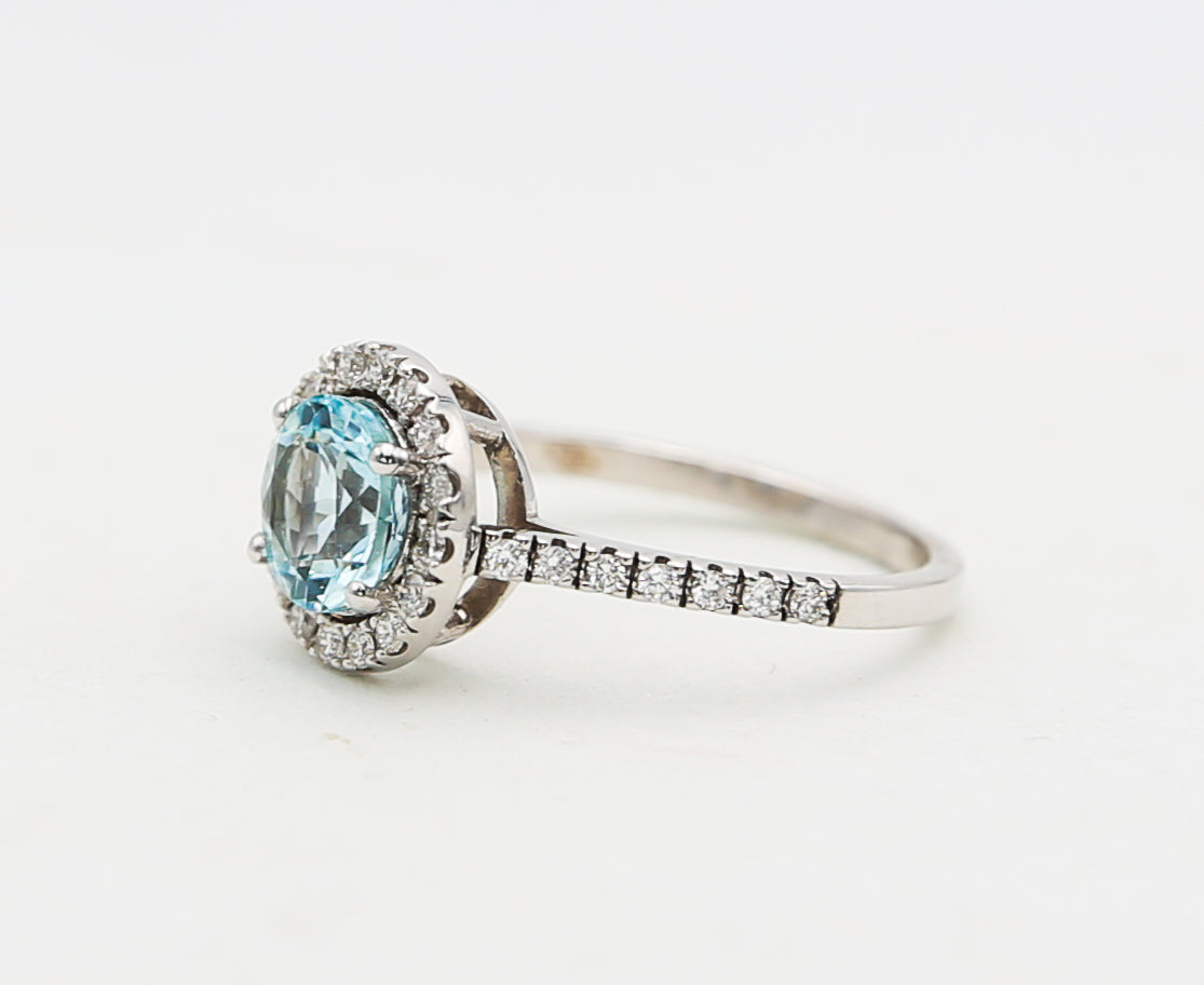 Gold ring with aquamarine and diamonds