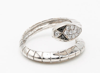 White gold ring with white and black diamonds