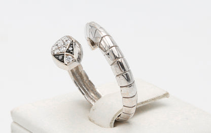 White gold ring with white and black diamonds