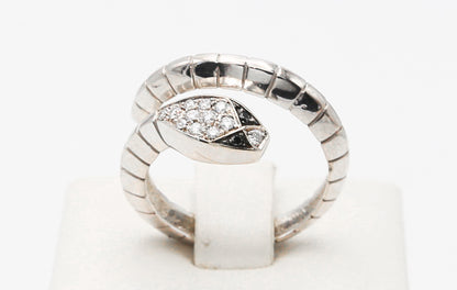 White gold ring with white and black diamonds