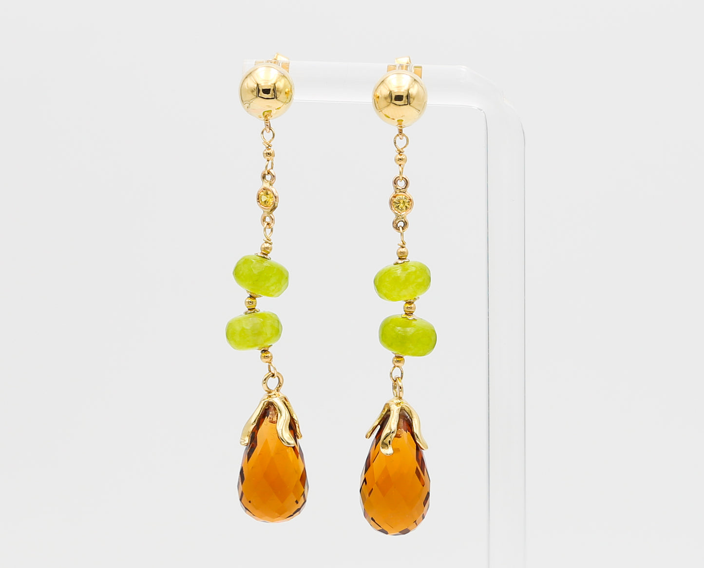 Gold earrings with stones