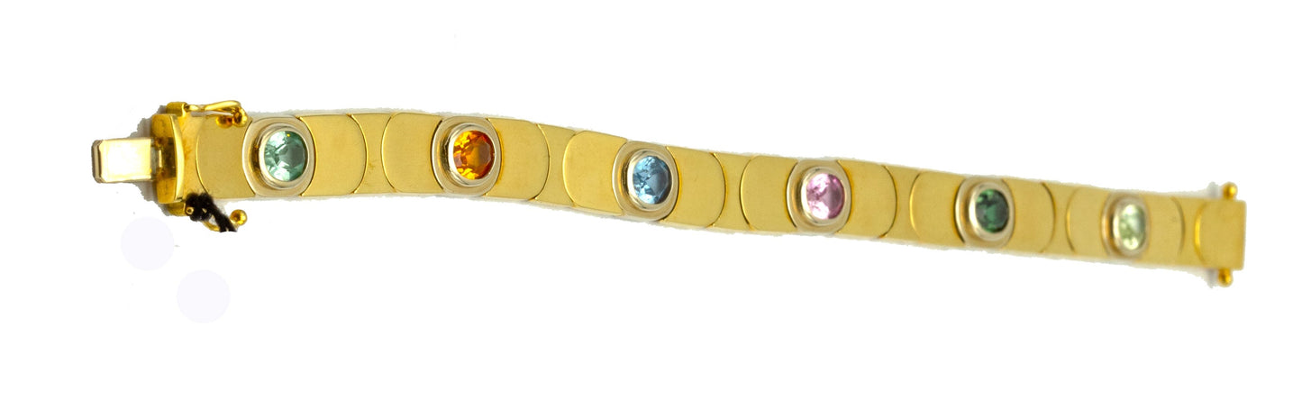 Bracciale in oro giallo con pietre