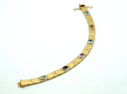 Bracciale in oro giallo con pietre