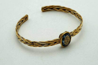 Bracciale rigido in oro giallo e pietre