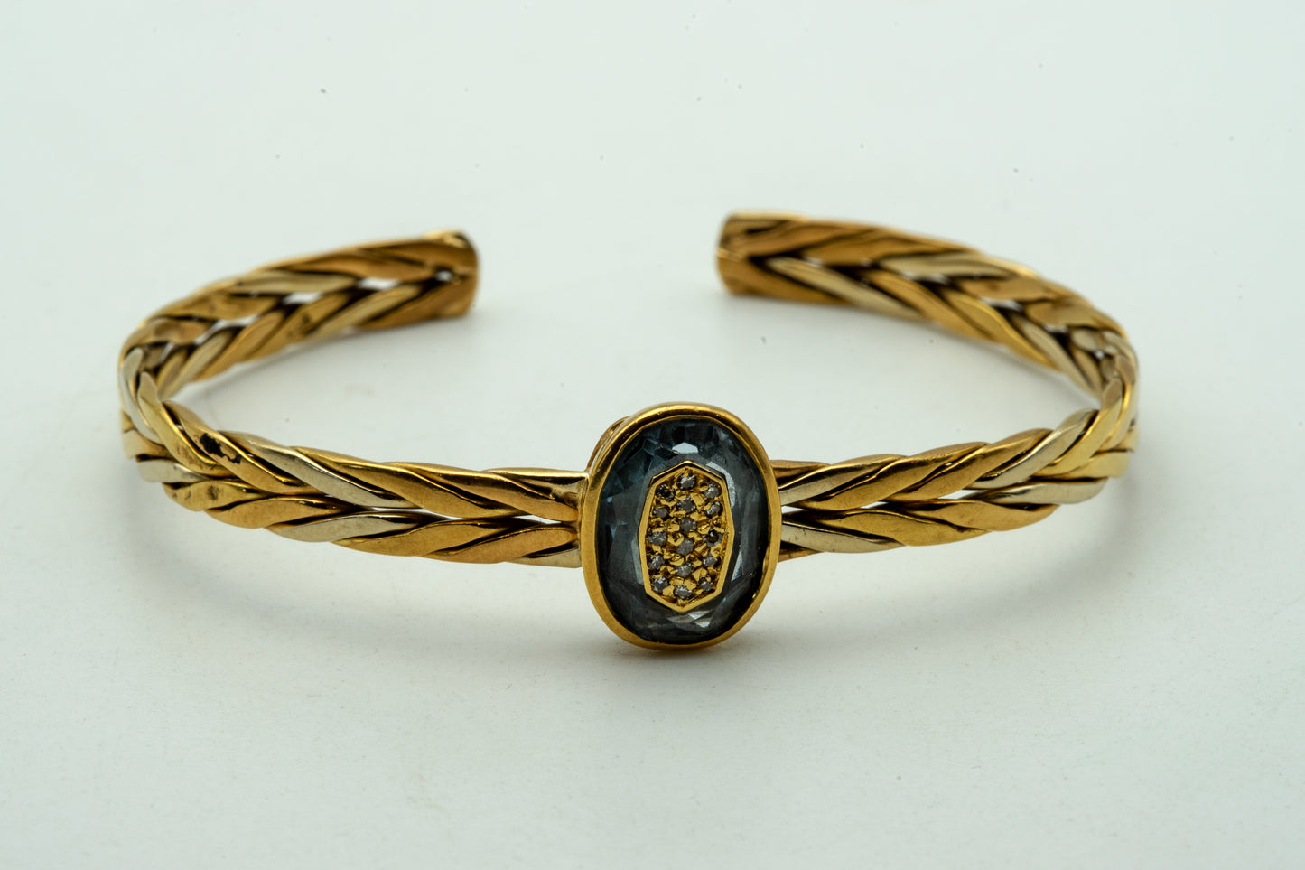 Bracciale rigido in oro giallo e pietre