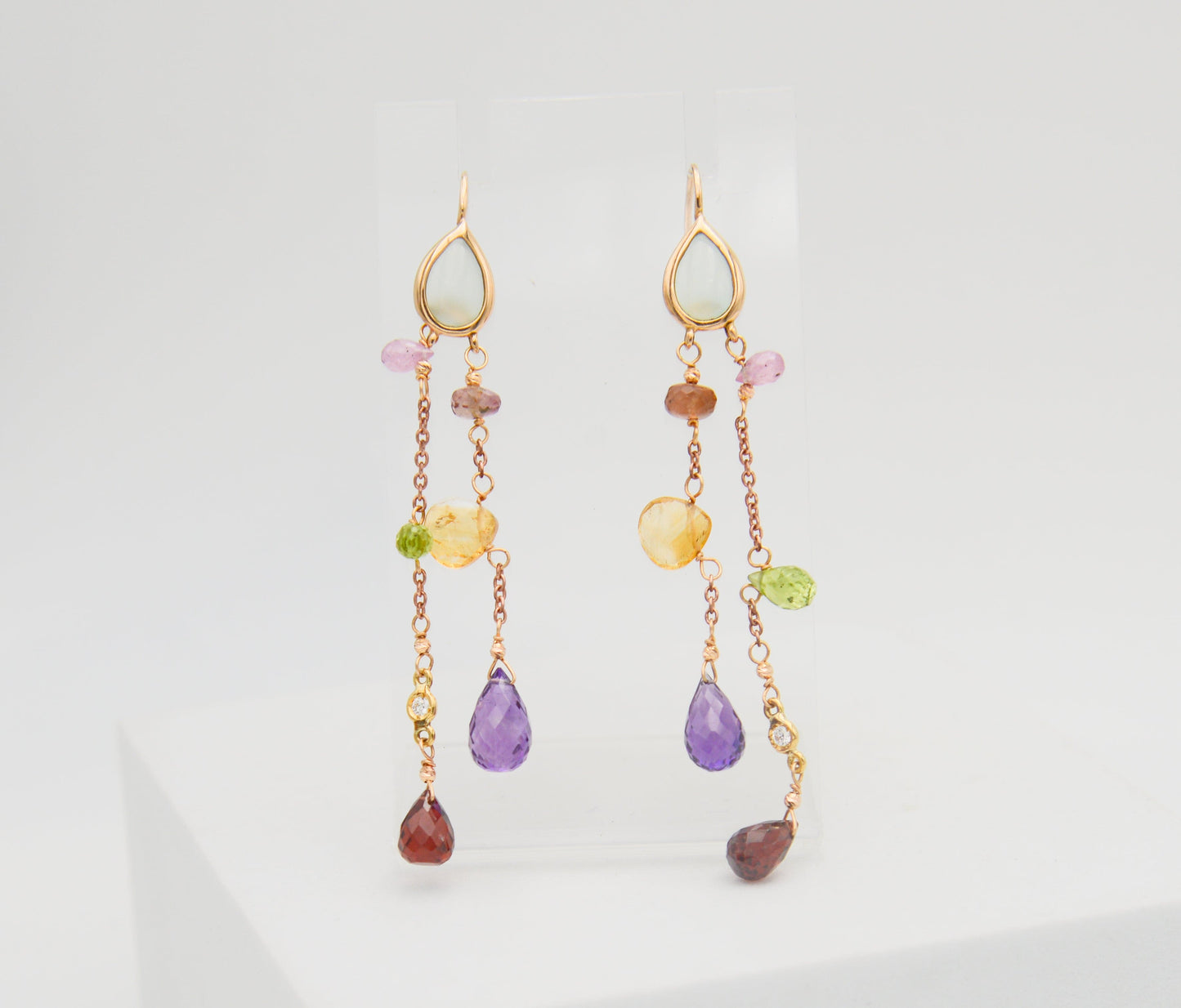 Gold earrings with diamonds and tourmalines