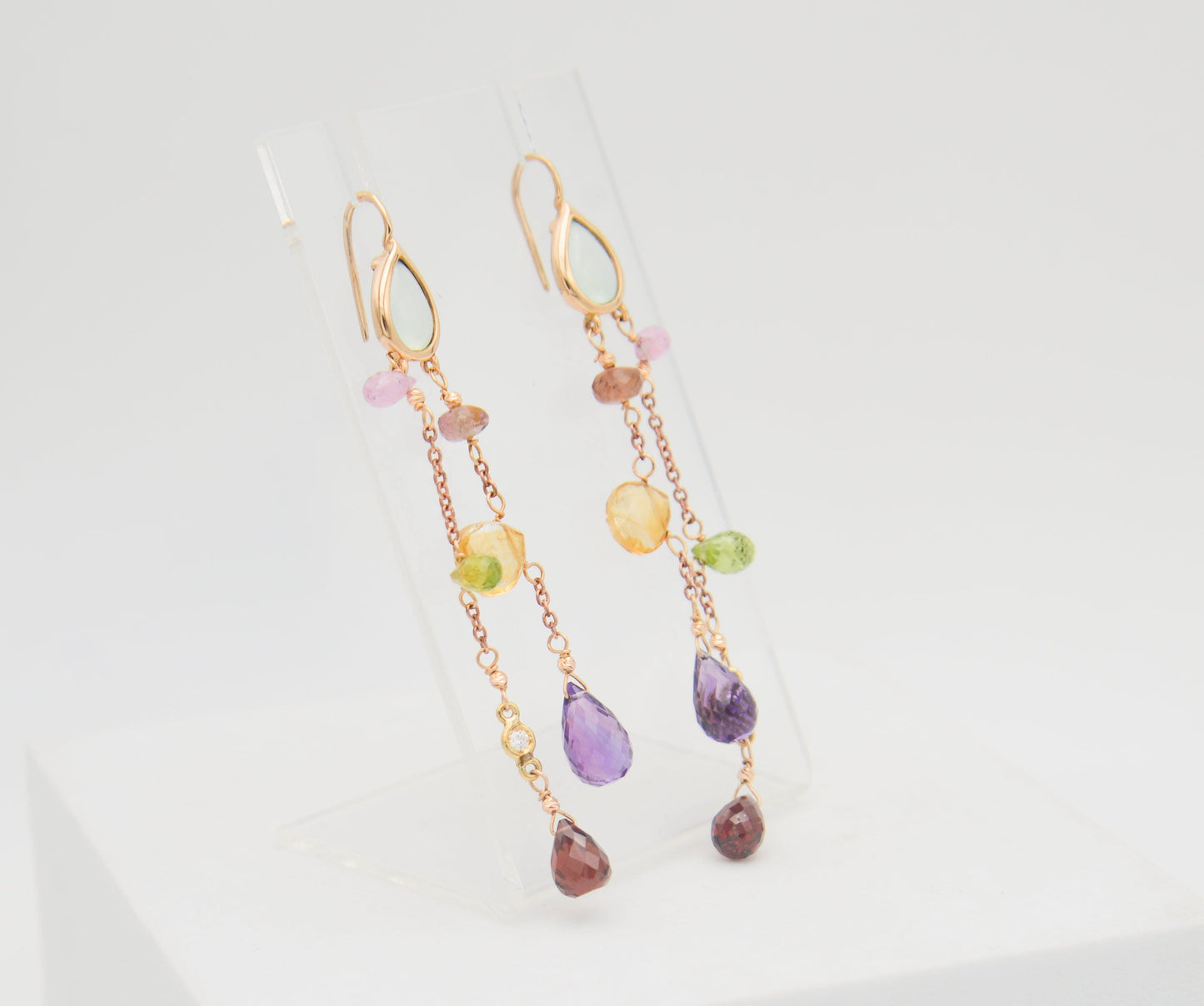 Gold earrings with diamonds and tourmalines