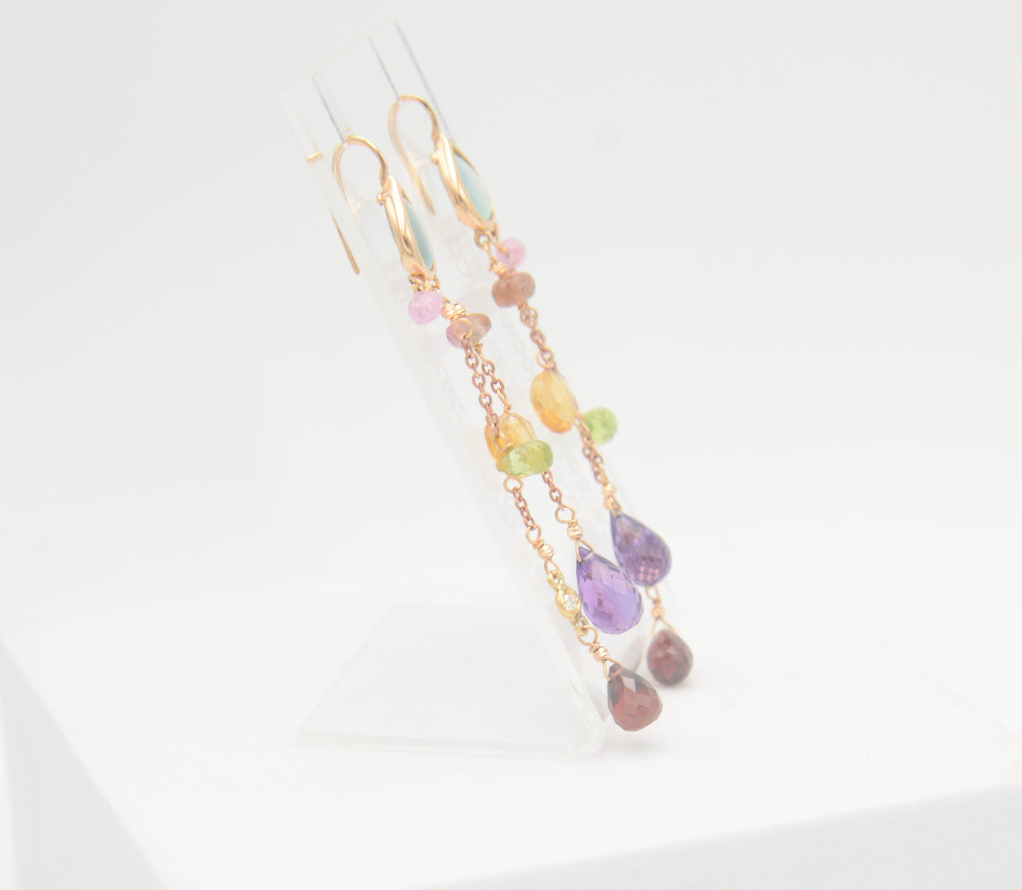 Gold earrings with diamonds and tourmalines