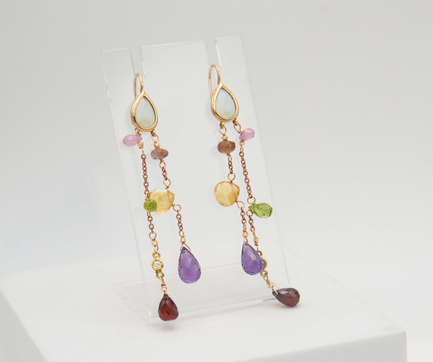 Gold earrings with diamonds and tourmalines