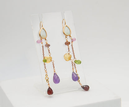 Gold earrings with diamonds and tourmalines