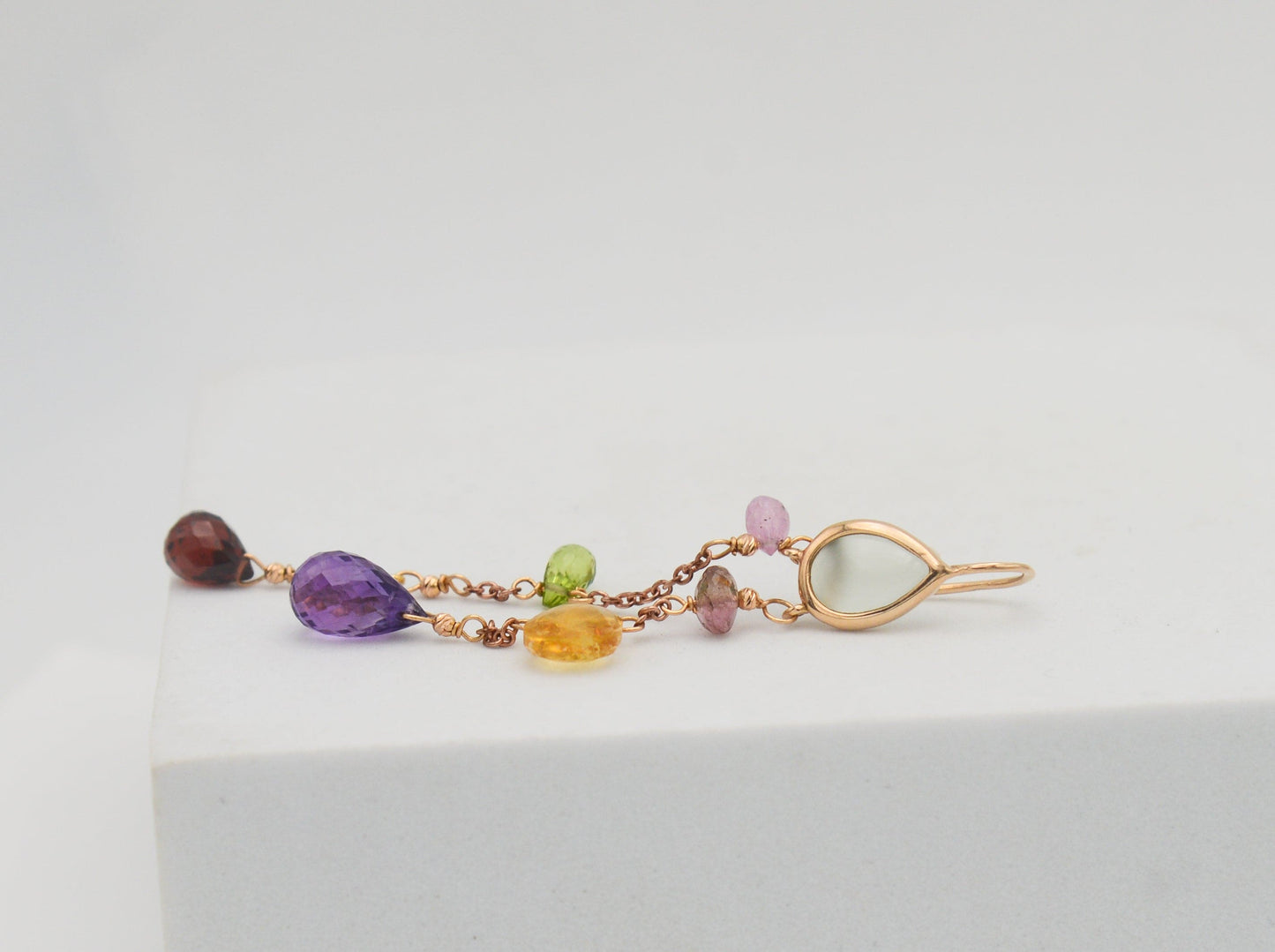 Gold earrings with diamonds and tourmalines