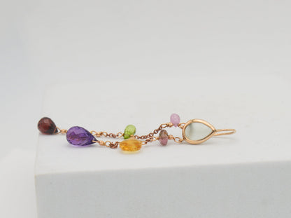 Gold earrings with diamonds and tourmalines