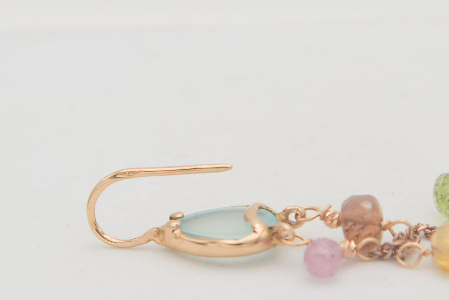 Gold earrings with diamonds and tourmalines