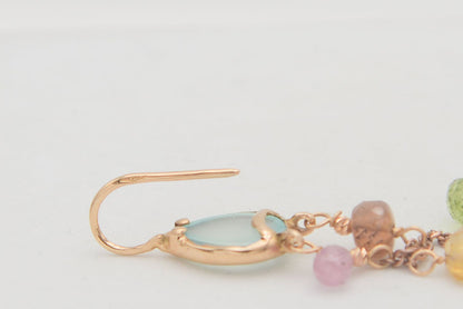 Gold earrings with diamonds and tourmalines