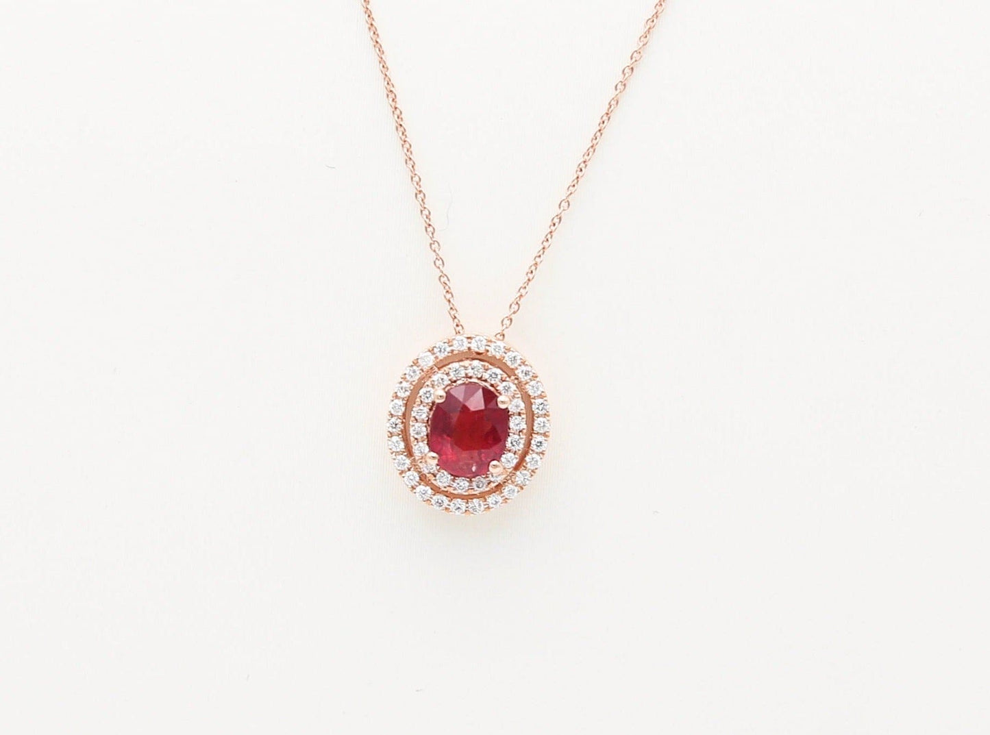 Collana con pendente oro rosa rubino e diamanti