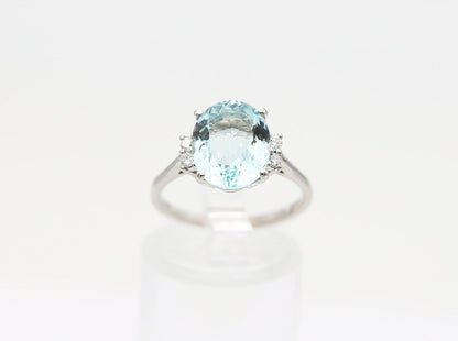 Gold ring with aquamarine and diamonds